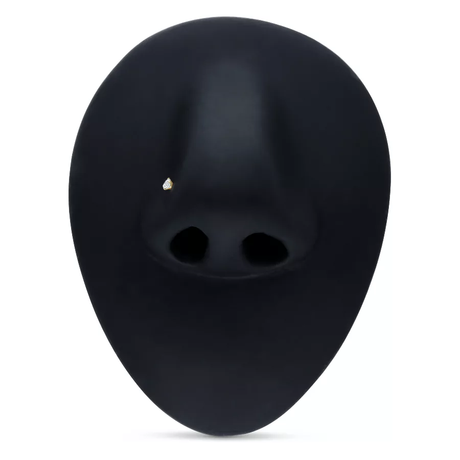 Piercing al naso in oro 18k con piccolo cristallo bianco su display nero