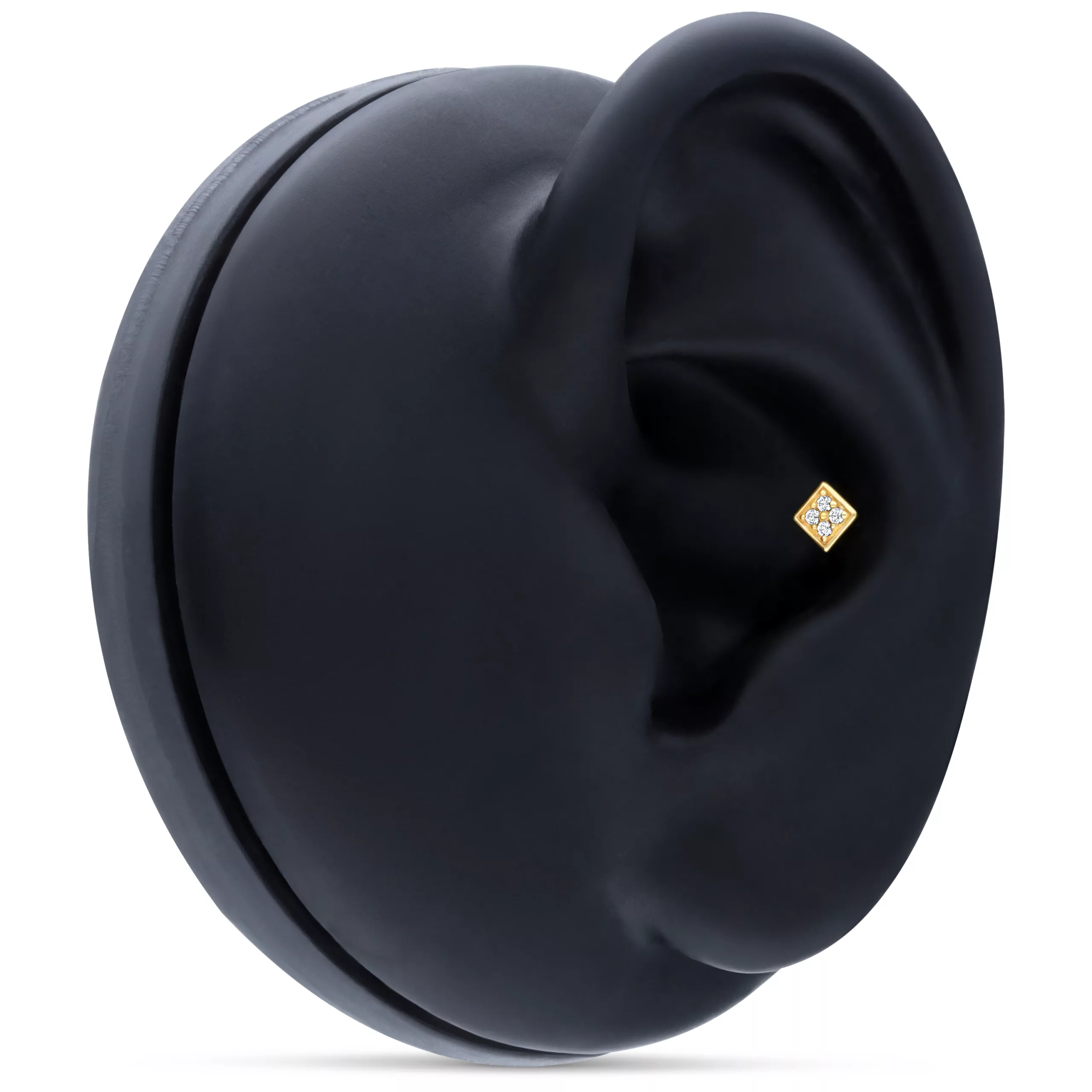 Accessorio quadrato in oro su display nero per orecchio