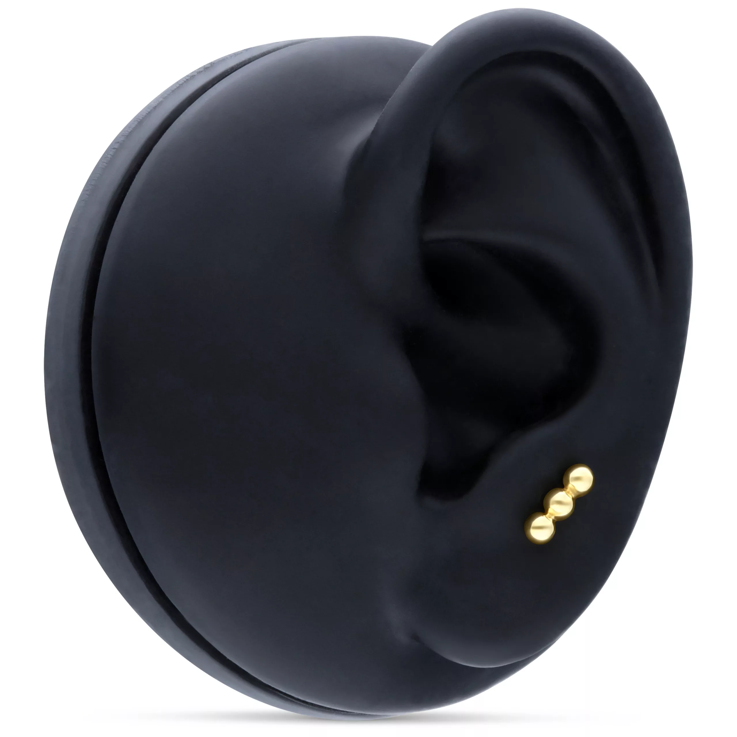 Attacco in oro 14K con 3 sfere per piercing all'orecchio Attacco in oro 14K con 3 sfere su un modello di orecchio nero