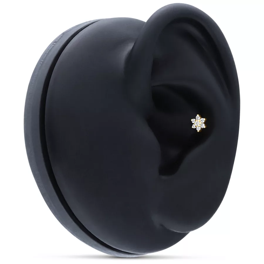 Fiore d'oro 14K con cristalli su display nero per orecchio
