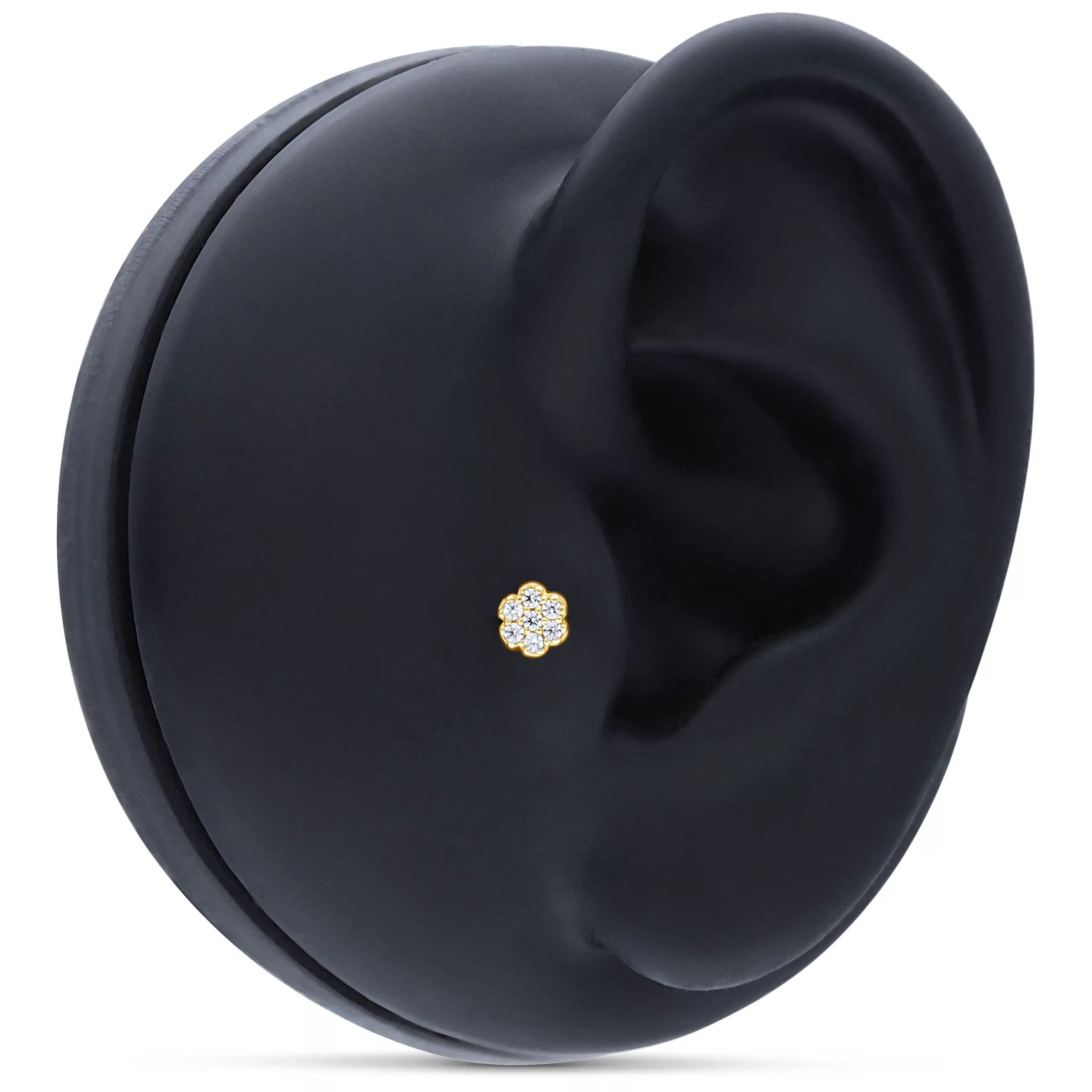 Accessorio floreale dorato con cristalli chiari su modello di orecchio nero