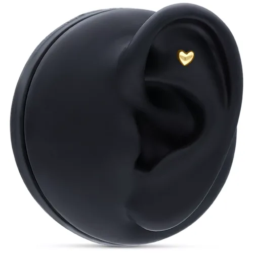 Barbell dorato a forma di cuore su display nero per orecchio