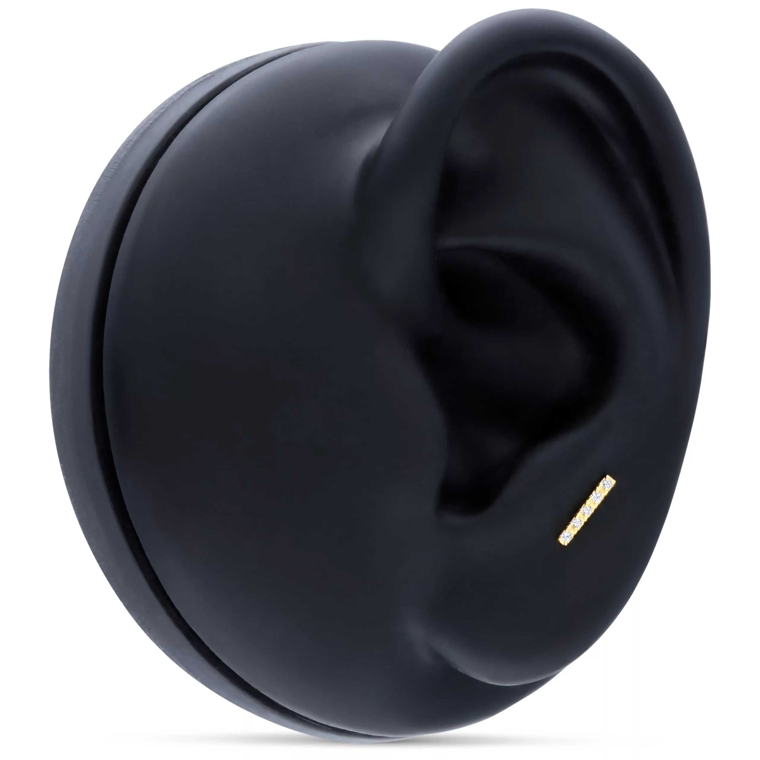 Orecchino a barra in oro 18K con cinque cristalli chiari su sfondo nero