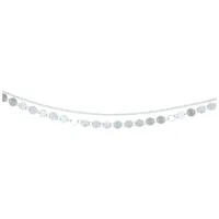 Cavigliera multistrato in argento su sfondo bianco