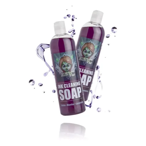 Due bottiglie di Auafee Ink Cleaning Soap con liquido viola su sfondo bianco