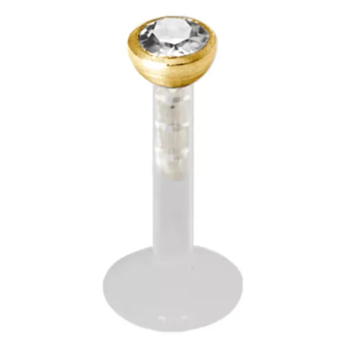 Labret push-fit dorato con cristallo chiaro su sfondo bianco
