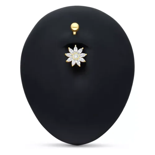 Piercing all'ombelico in oro 18k con fiore di cristallo chiaro su sfondo nero