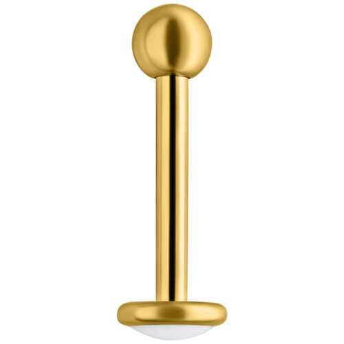 Piercing labret in oro titanio su sfondo bianco