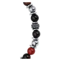 Bracciale in acciaio chirurgico con pietre nere e rosse su sfondo bianco