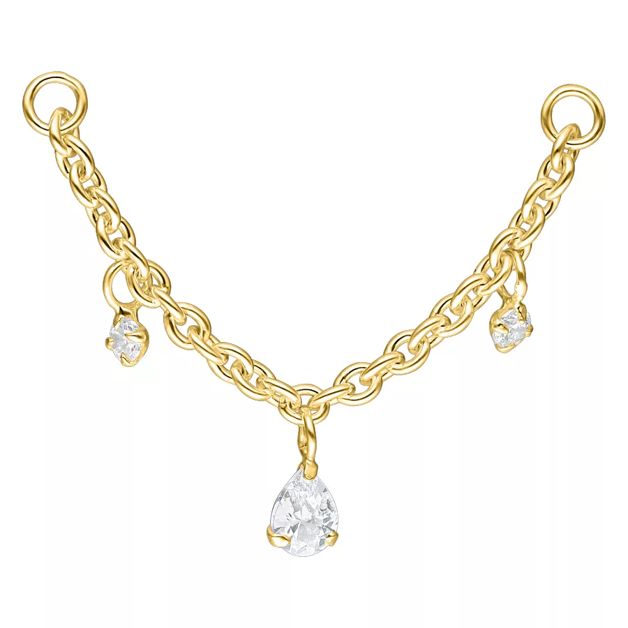 Catena per piercing dorata con gocce di cristallo Catena dorata con gocce cristalline pendenti su sfondo bianco