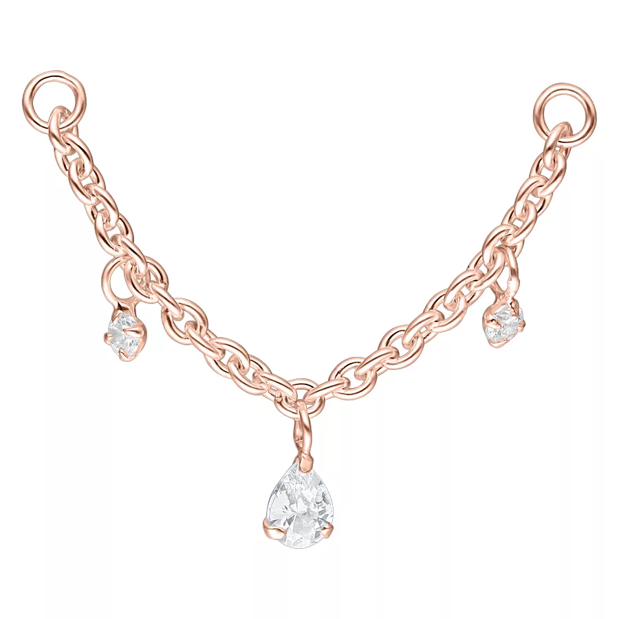 Catena in oro rosa con gocce di cristallo pendenti su sfondo bianco