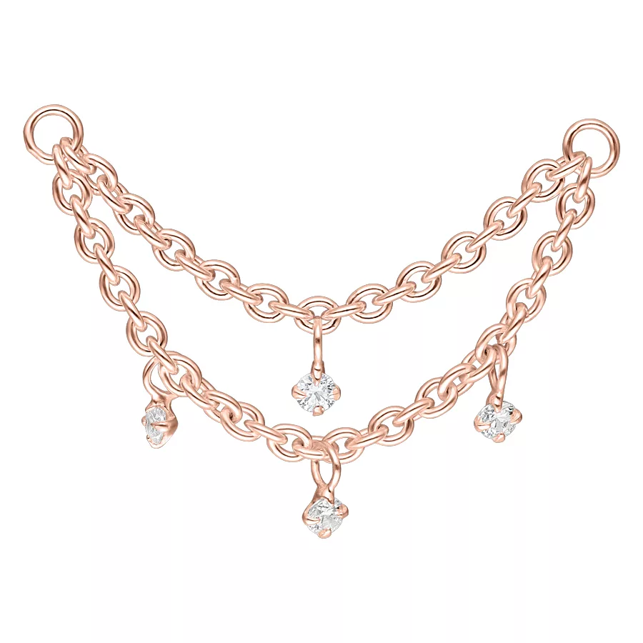 Catena piercing a due strati in rosé con cristalli chiari su sfondo bianco