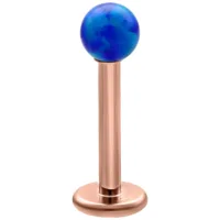 Labret con sfera in opale blu scuro su asta in titanio oro rosa, sfondo studio