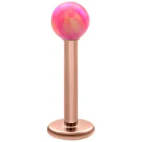 Labret con asta in oro rosa e sfera di opale rosa su sfondo bianco