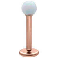 Labret con opale sintetico bianco e barra in titanio placcata in oro rosa su sfondo bianco