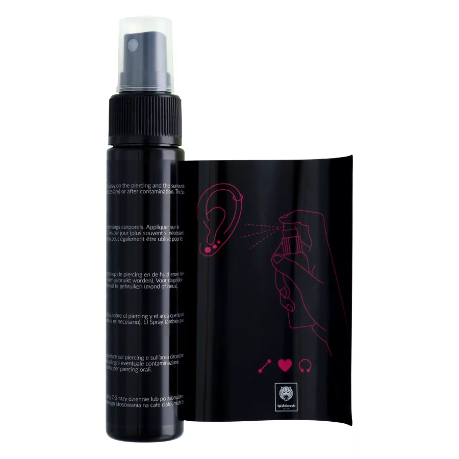 Flacone e confezione di spray per piercing nero su sfondo bianco