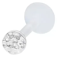 Piercing labret in argento con finitura martellata su sfondo bianco