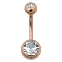 Piercing all'ombelico in oro rosa con due pietre cristalline su sfondo bianco