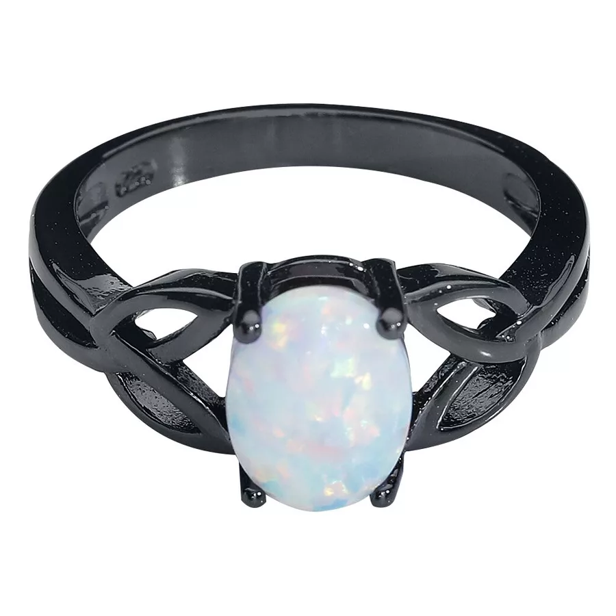 Anello nero in acciaio chirurgico con opale bianco su sfondo neutro