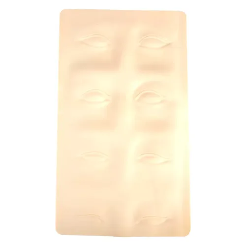 Piastra in silicone beige con contorni di sopracciglia su sfondo bianco