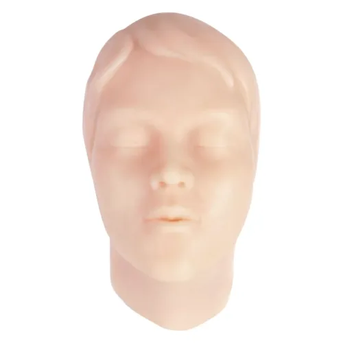 Forma del viso in silicone beige per esercitazioni di tatuaggio su sfondo bianco