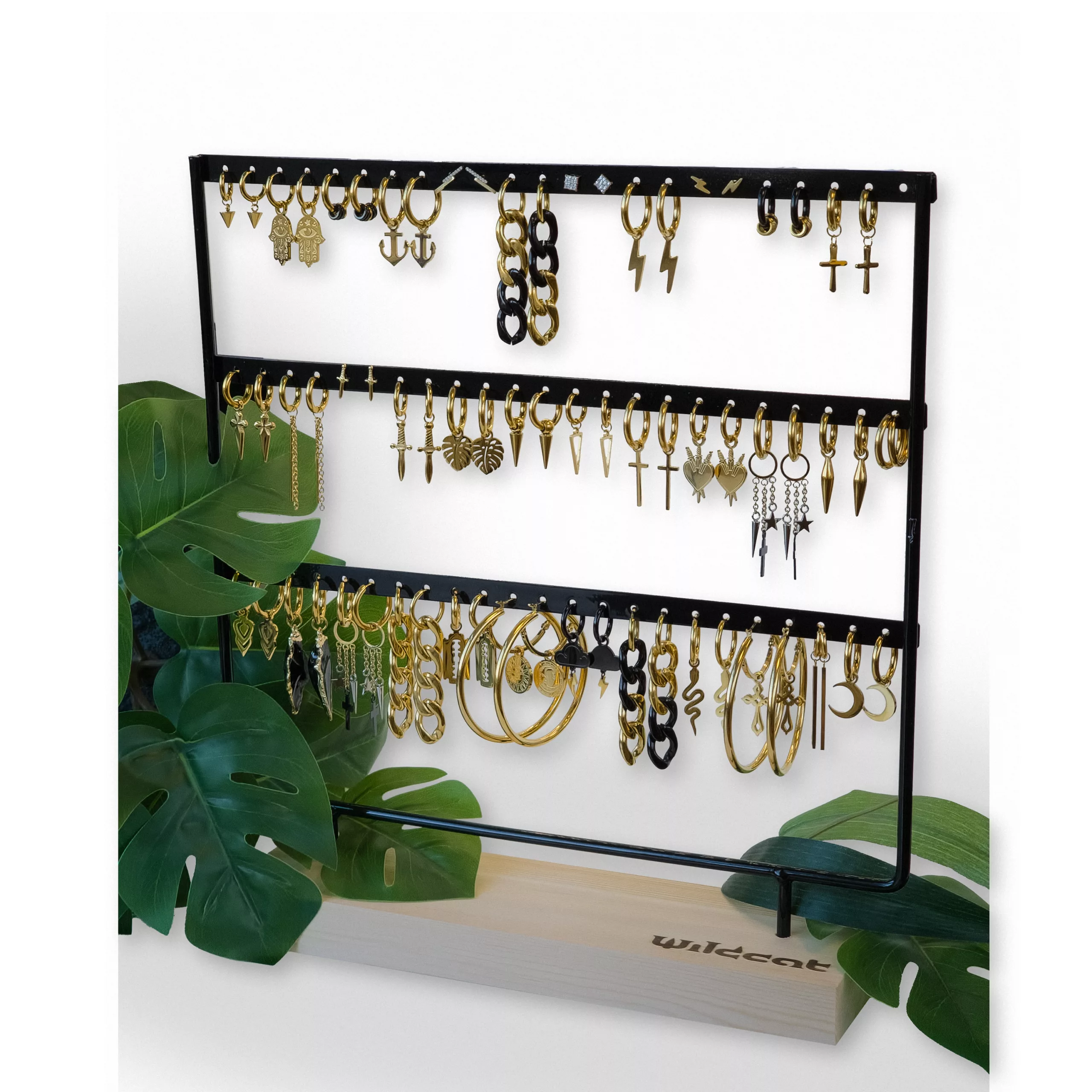 Display nero per orecchini a cerchio con gioielli Display nero Wildcat per orecchini con cerchi dorati su base di legno