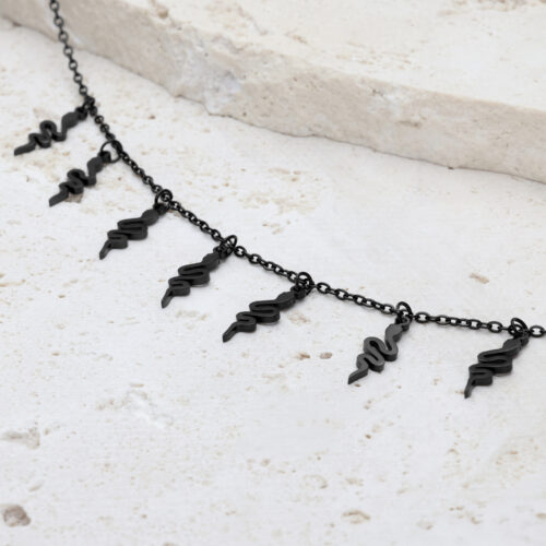 Bracciale Snake nero con chiusura regolabile su pietra chiara