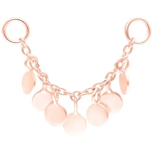 Catena piercing in oro rosa con sette ciondoli su sfondo bianco