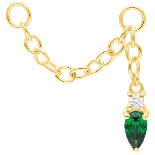 Catena piercing dorata con cristallo verde smeraldo, lunga 20mm su sfondo bianco