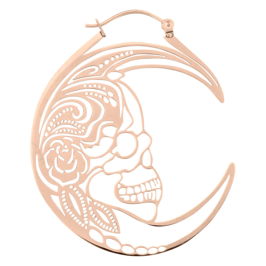 Orecchini in oro rosa con design a teschio su sfondo bianco