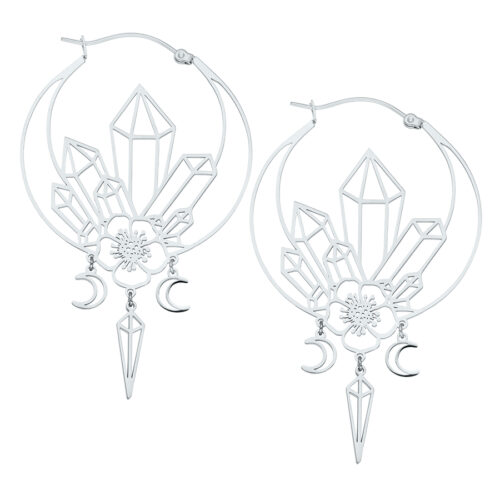 Orecchini in argento con motivi geometrici di cristallo e pendenti a forma di luna su sfondo bianco