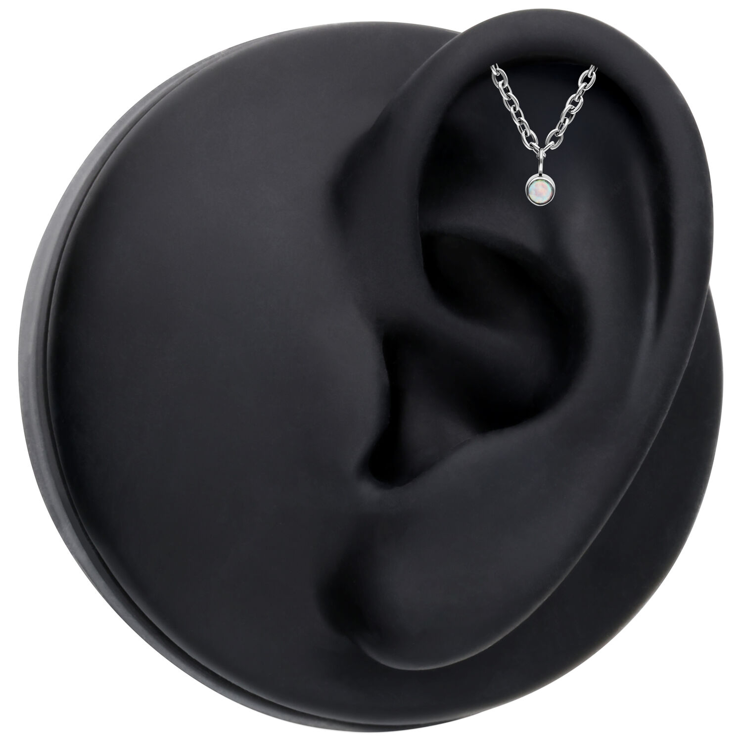 Attacco Push Fit color argento con opale sintetico su modello di orecchio nero