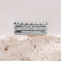 Triple Bubble Crystal Clicker argento con cristalli, 12mm, su sfondo chiaro