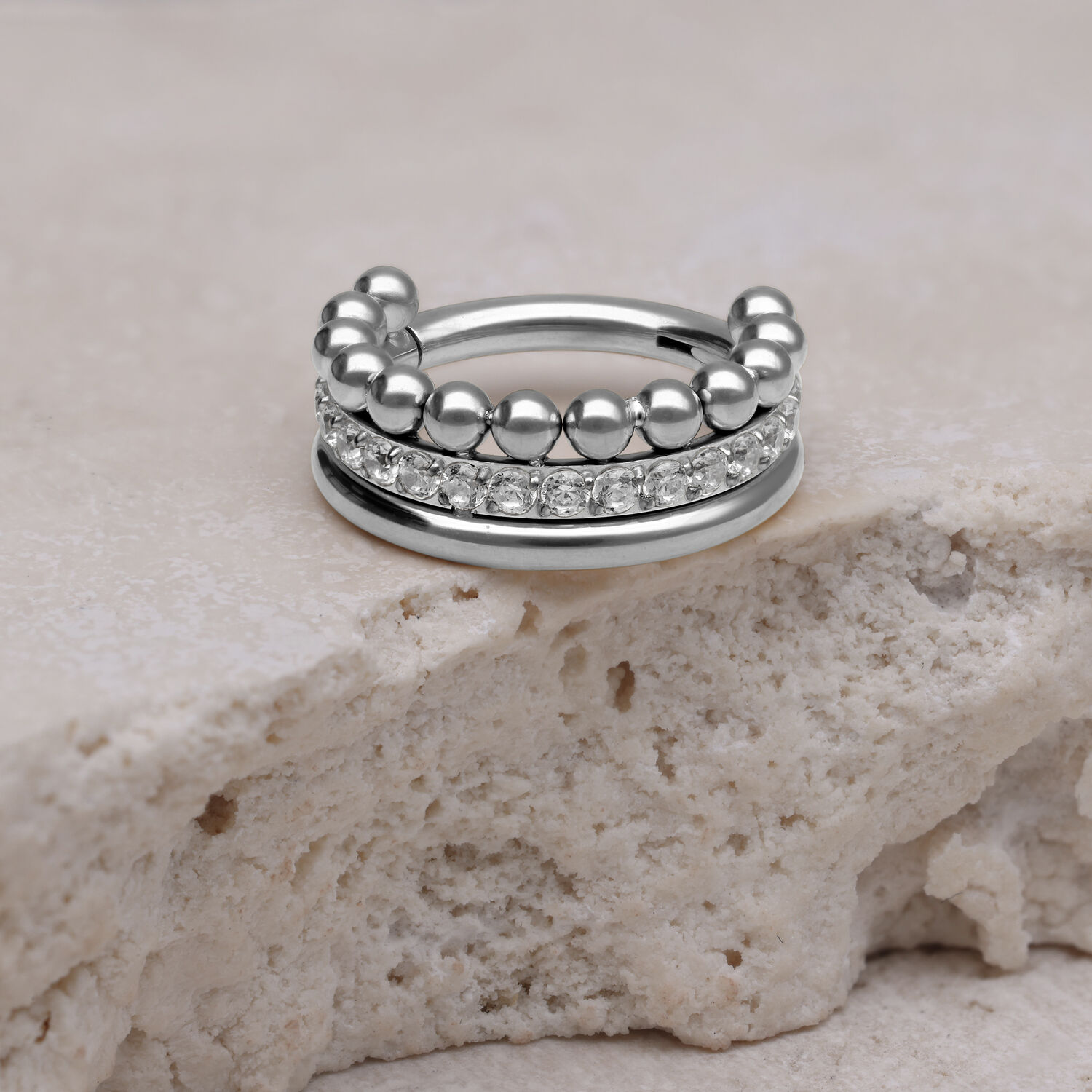 Clicker Triple Bubble Crystal argentato su pietra chiara