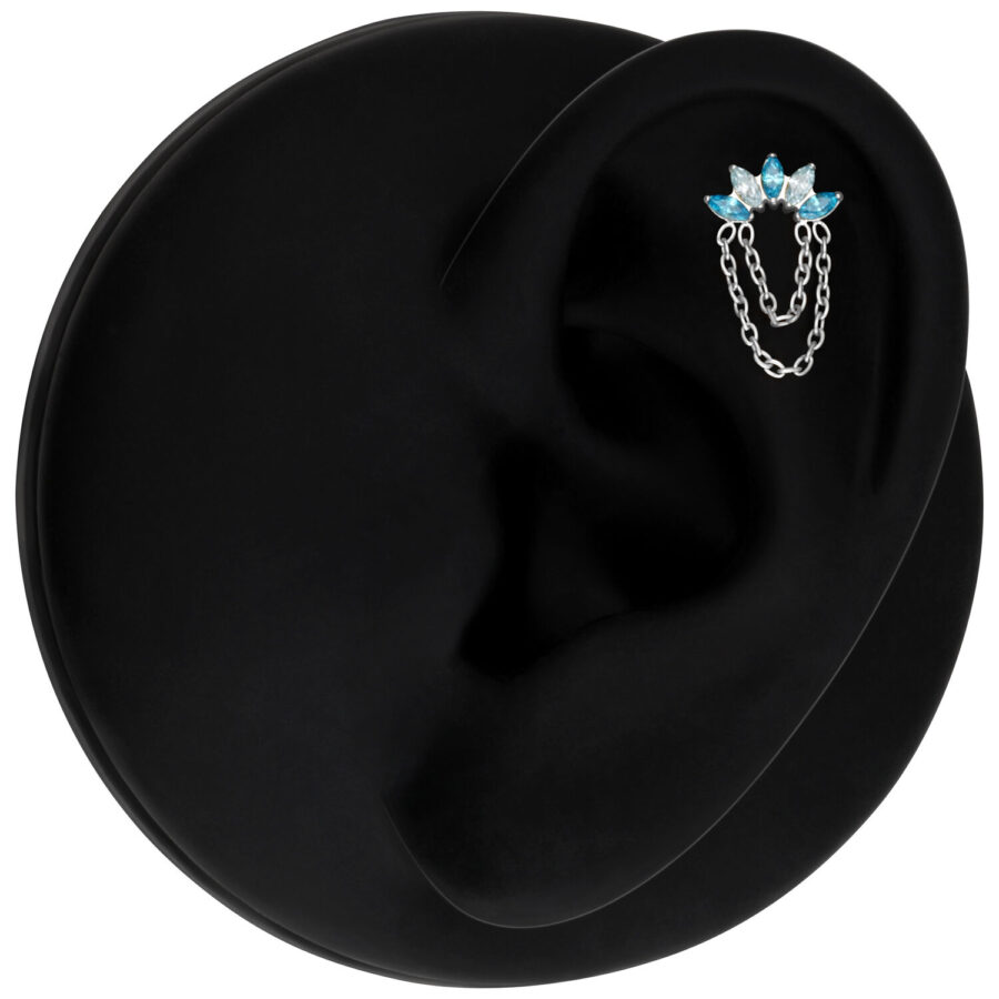 Accessorio Push Fit in argento con cristalli lavanda e turchese su sfondo nero