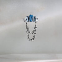 Accessorio Push Fit argento con cristalli lavanda e turchese su sfondo chiaro