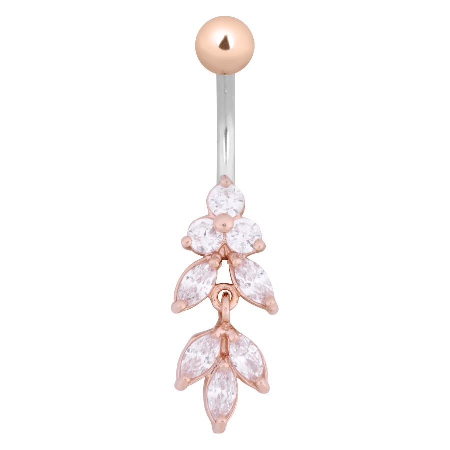 Piercing all'ombelico in oro rosa con cristalli su sfondo bianco