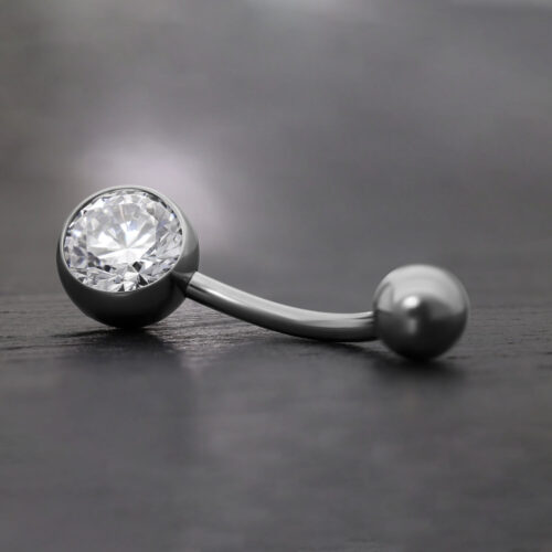 Bananabell nero in titanio con cristallo chiaro su sfondo grigio