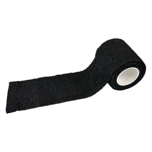 Fascia Grip nera, non tessuta, parzialmente srotolata, su sfondo bianco
