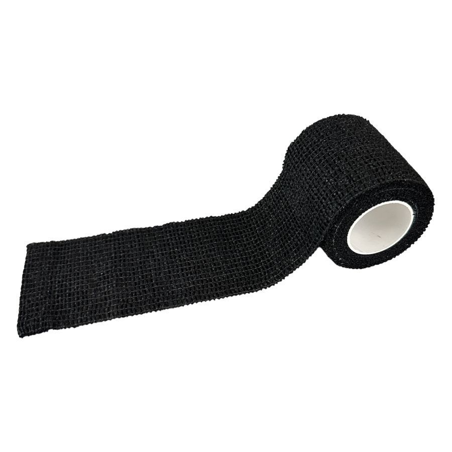 Fascia Grip nera, non tessuta, parzialmente srotolata, su sfondo bianco