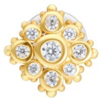 Labret dorato con cristalli chiari su sfondo bianco
