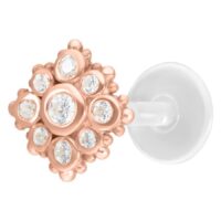 Labret in oro rosa con cristalli chiari su sfondo bianco