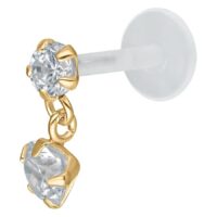 Labret d'oro con cristallo pendente Labret d'oro con pendente di cristallo chiaro su sfondo bianco