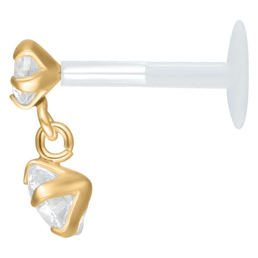 Labret d'oro con cristallo pendente Labret d'oro con cristallo chiaro pendente su sfondo bianco