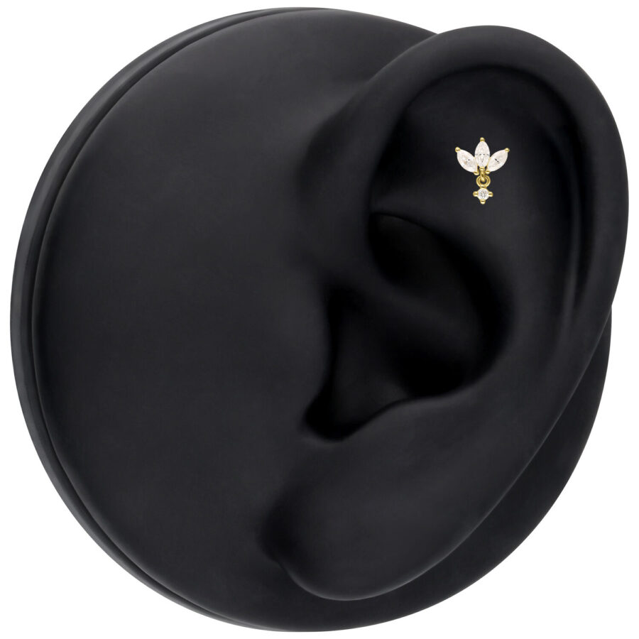 Attacco Lotus dorato con Moissanite su display nero per orecchio