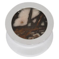 Plug in argento con design Outback Jasper Plug in argento in acciaio chirurgico con intarsio rotondo in Outback Jasper su sfondo bianco