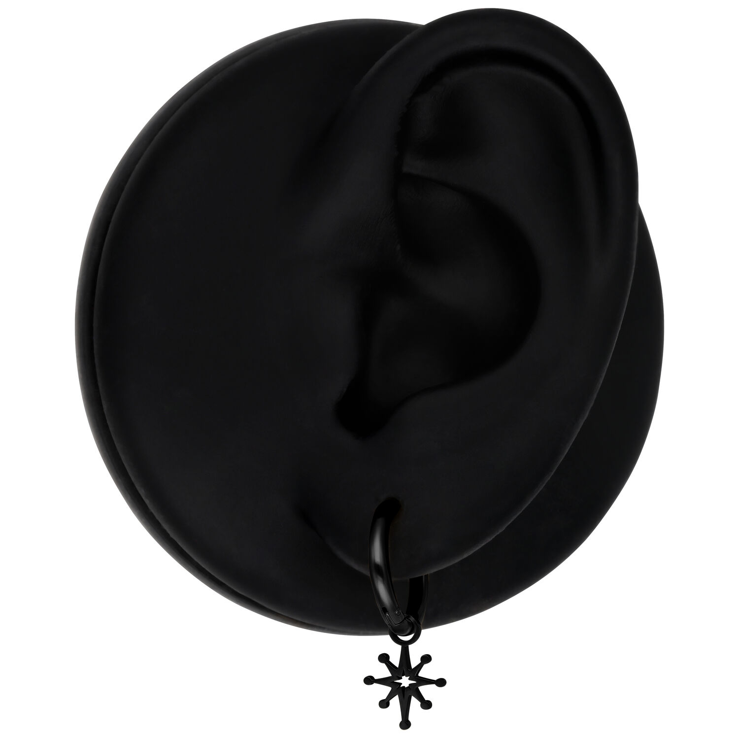 Mini Polar Star orecchini neri su orecchio nero su sfondo bianco