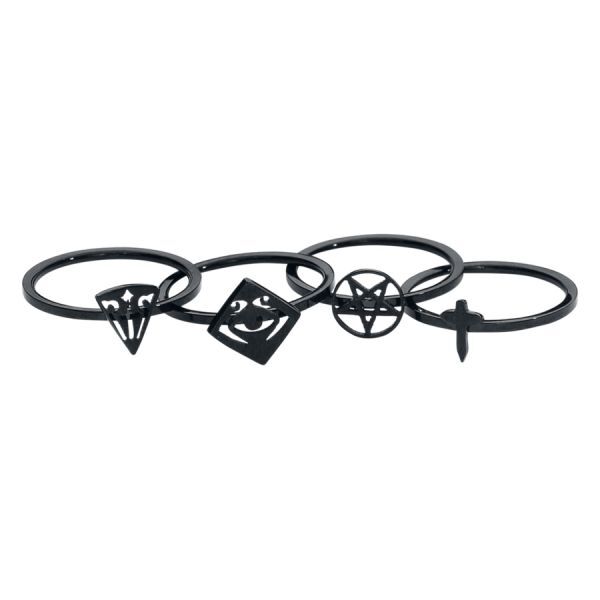 Schwarzes Knuckle Ring Set aus Chirurgenstahl Vier schwarze Knuckle Ringe aus Chirurgenstahl mit verschiedenen Symbolen auf weißem Hintergrund