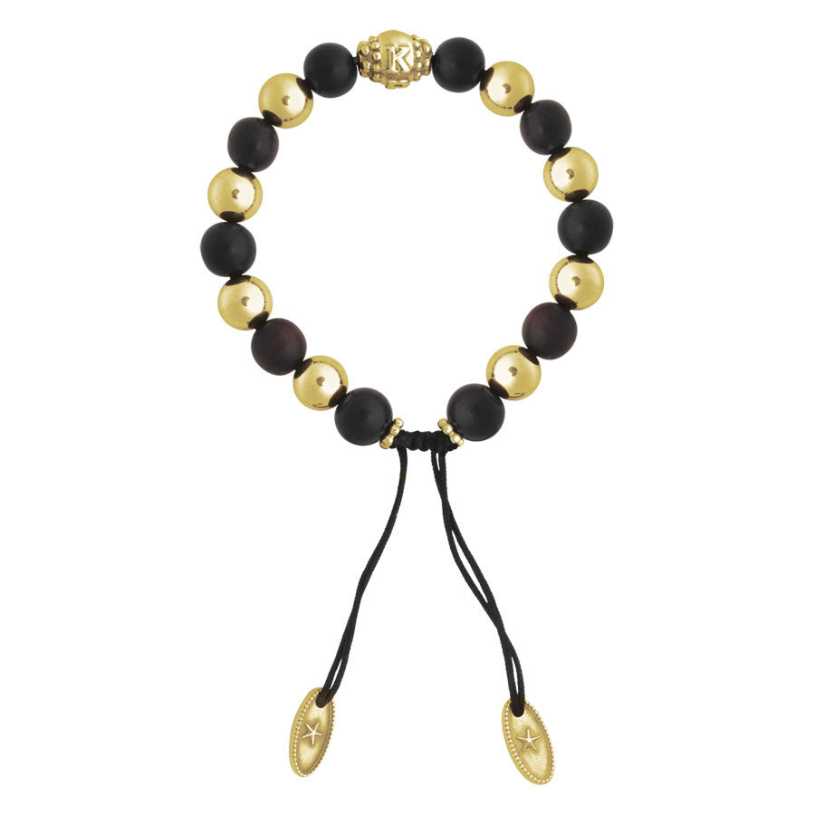 Bracciale unisex con perle dorate e nere su sfondo bianco