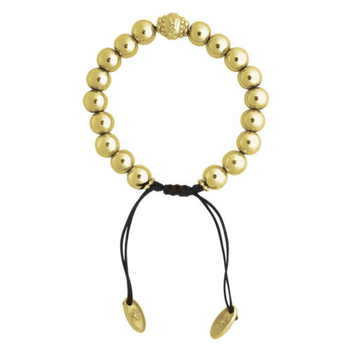 Bracciale dorato con perle rotonde e cinturino nero su sfondo bianco